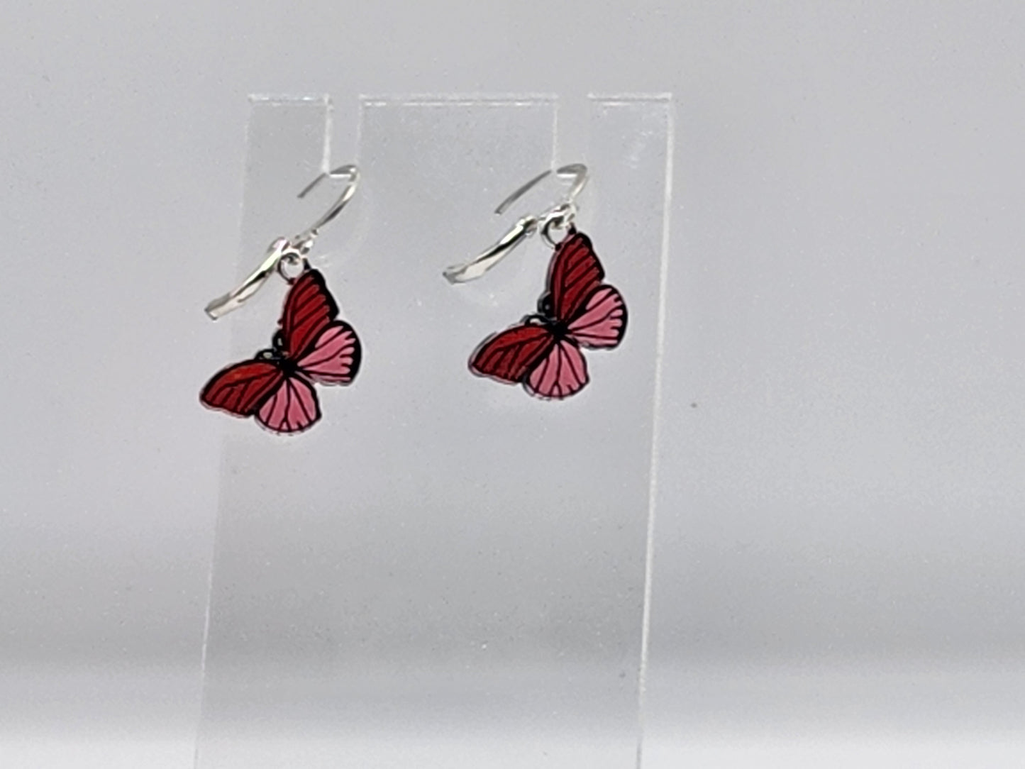 Pink striped hoop butterfly earrings