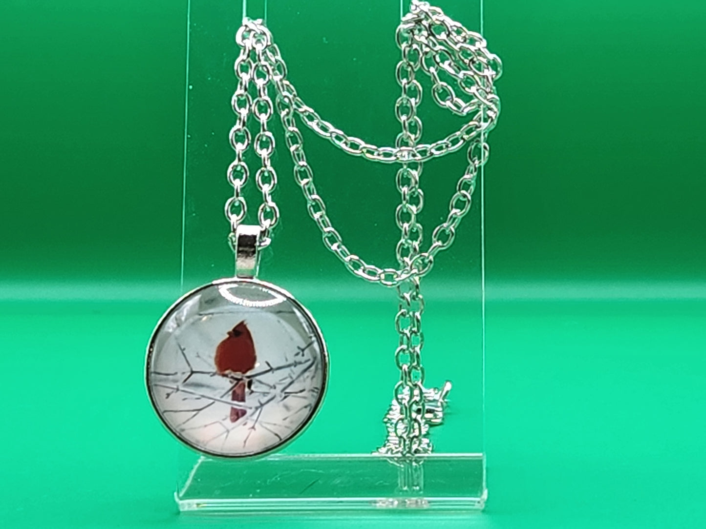 Red bird cardinal on branch in bubble pendant necklace