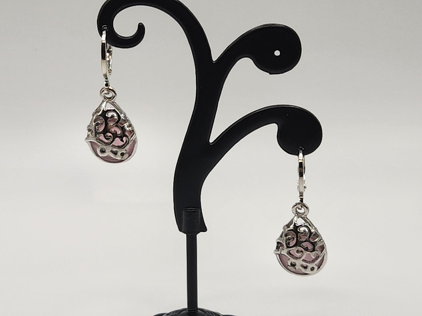 Rose quartz scroll cut out earrings