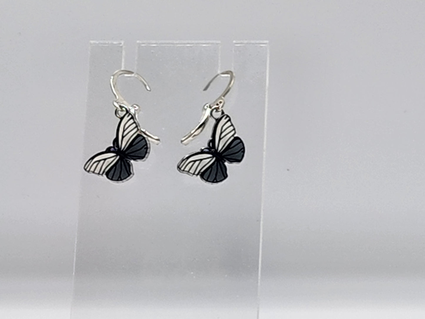 White and black striped hoop butterfly earrings